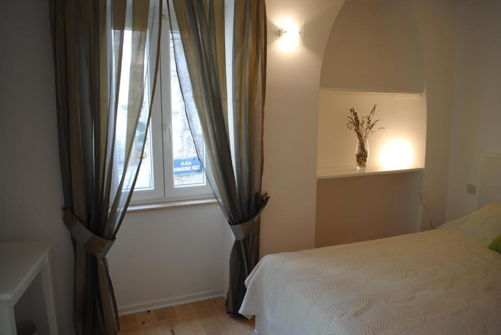 Rooms Piazzetta Крес Стая снимка